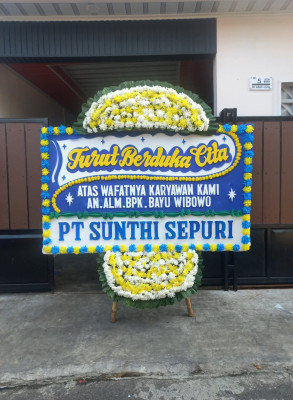 Papan Bunga Duka di Kombi