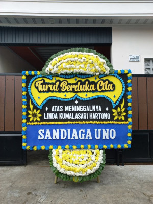 Papan Bunga Duka di Kombi